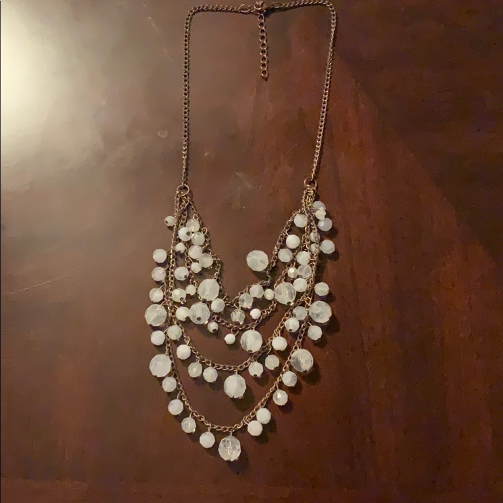 Draping necklace with white and clear beads